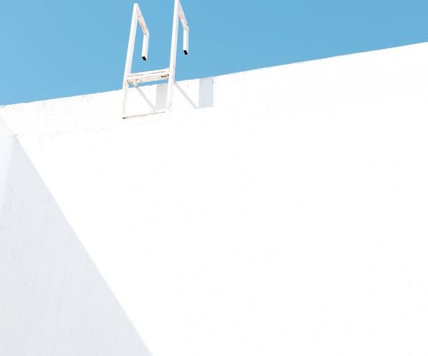 Clean minimalist gym space with cold blue shadows